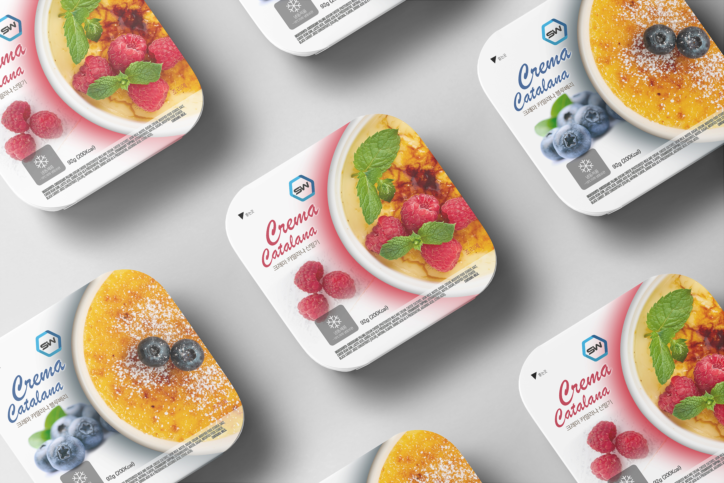 Crema Catalana raspberry and blueberry packages laid out in a pattern