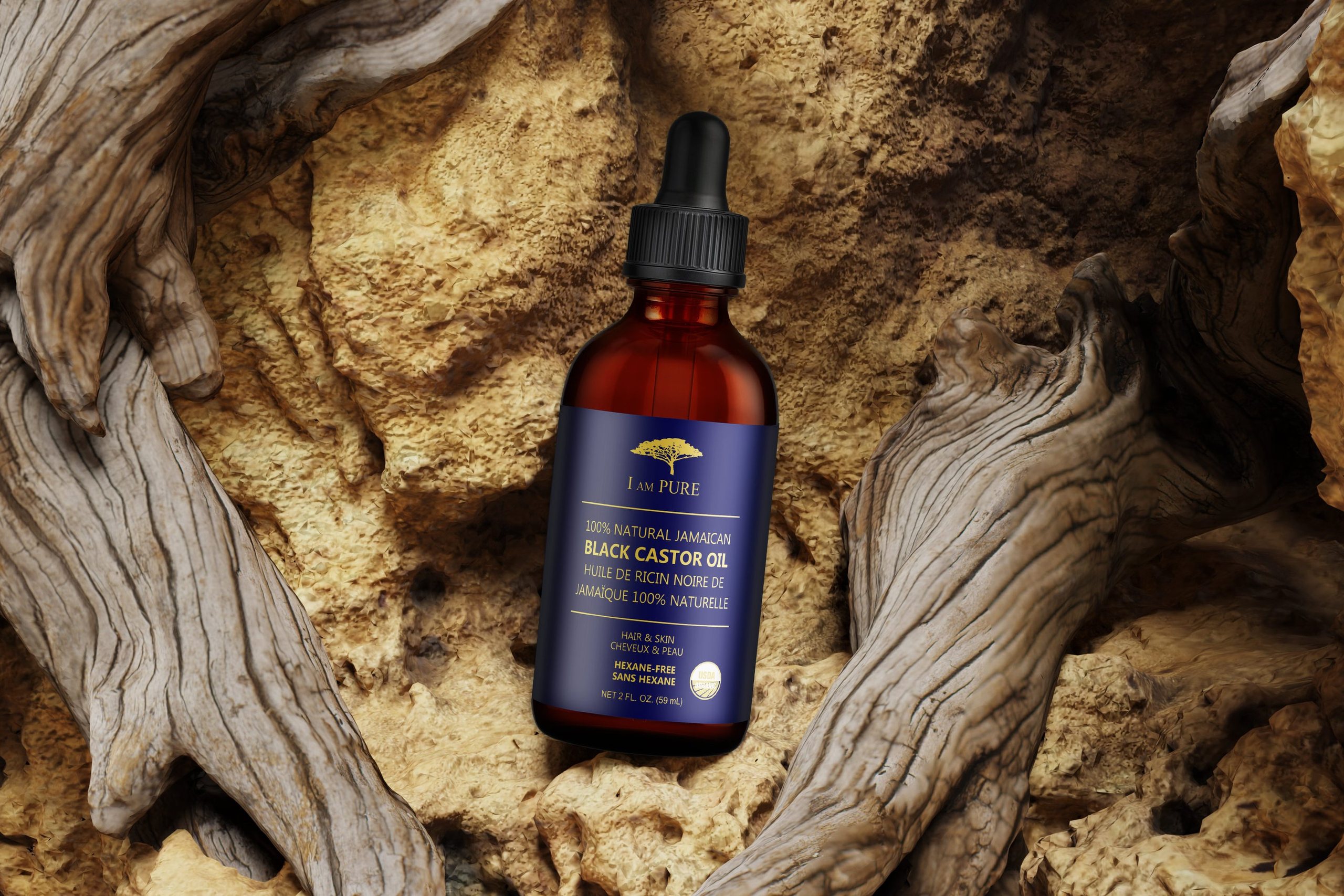 IAMPURE Jamaican Black Castor Oil on driftwood and rock