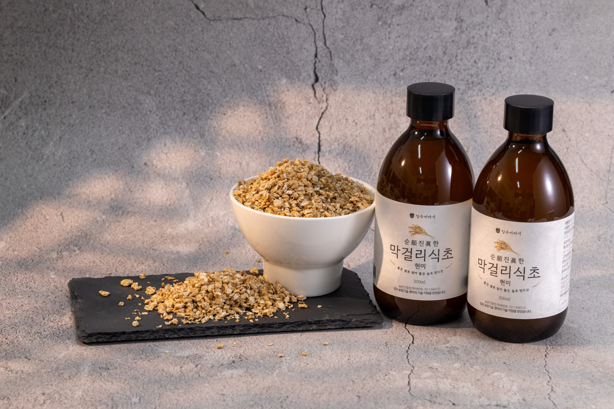 Makgeolli vinegar on slate and concrete