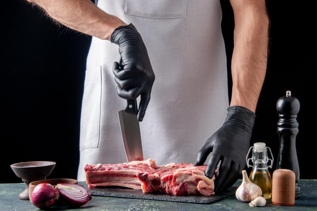 Butcher trimming Hanwoo ribs